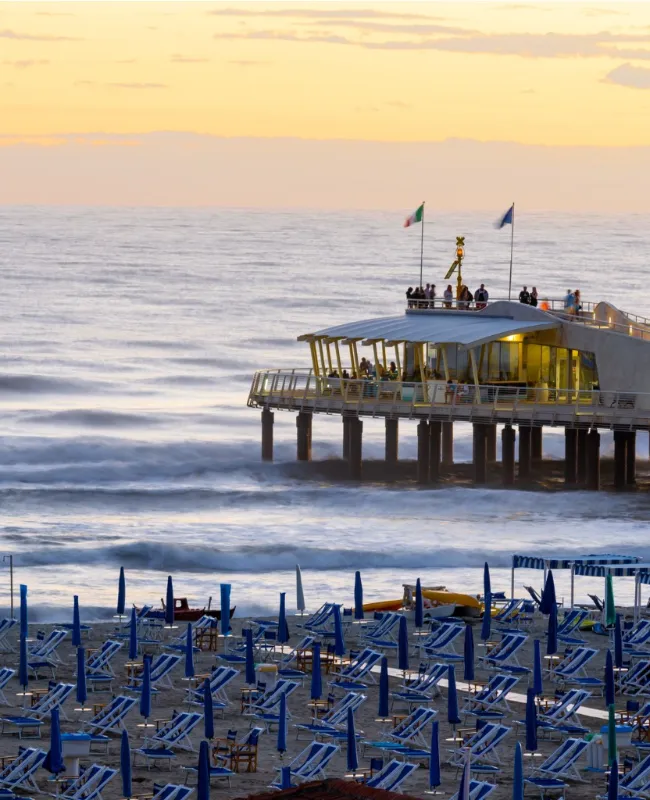 Versilia beach with views of the Mediterranean Sea, famous for its long sandy shores and vibrant nightlife along the coast.